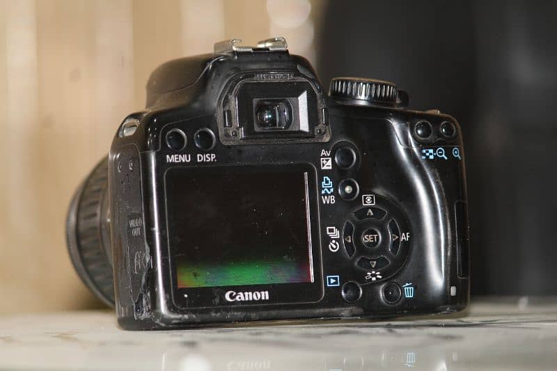 1000d canon with 18-55mm lens and all accessories 4