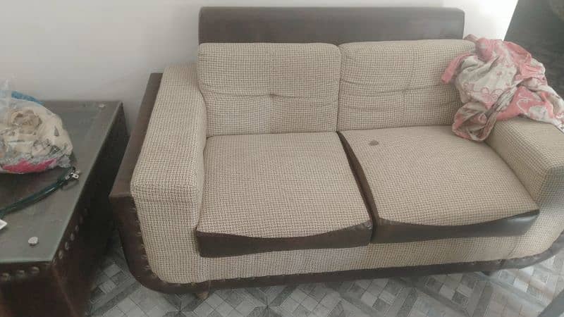 Slightly used 7 seater sofa set with center table 7