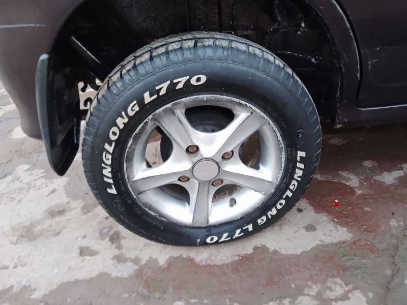 Daihatsu Cuore 2012 auto original pent new rem tyred DVD back cemra 15