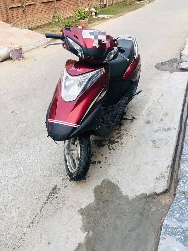 Scooty 100 cc 1