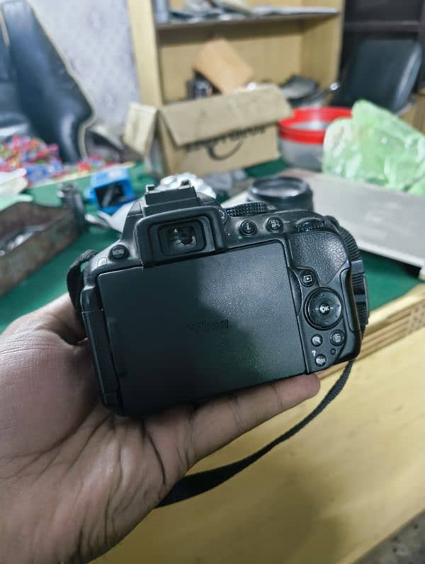 Nikon D5300 with three lens. 6