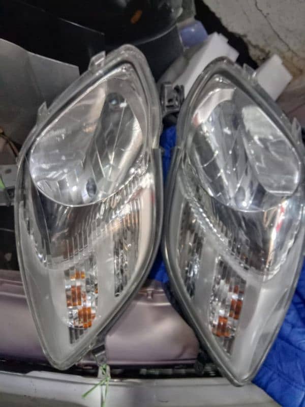 2010 model vitz original headlights 1