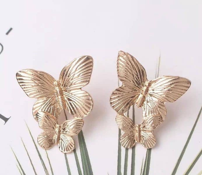 Pair of Alloy gold plated stylish butterfly design earrings 1