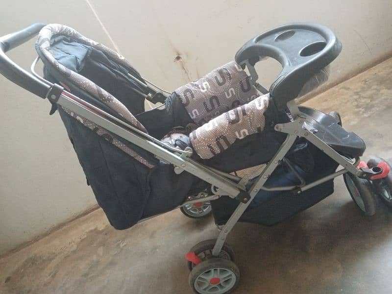 pram (scroller) in new condition 1