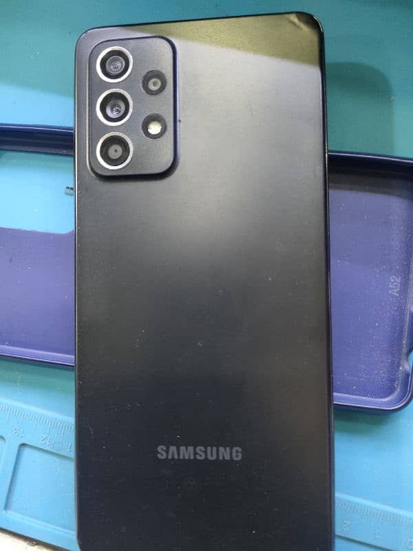 samsung A52 5G. Ram 8gb. Room 128gb. Black xolour only phone 1