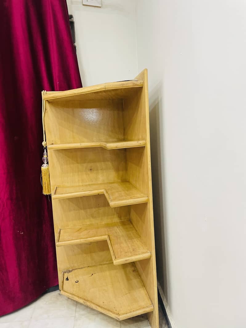 Bookshelf or rack especially constomized to fit the side of the wall 2