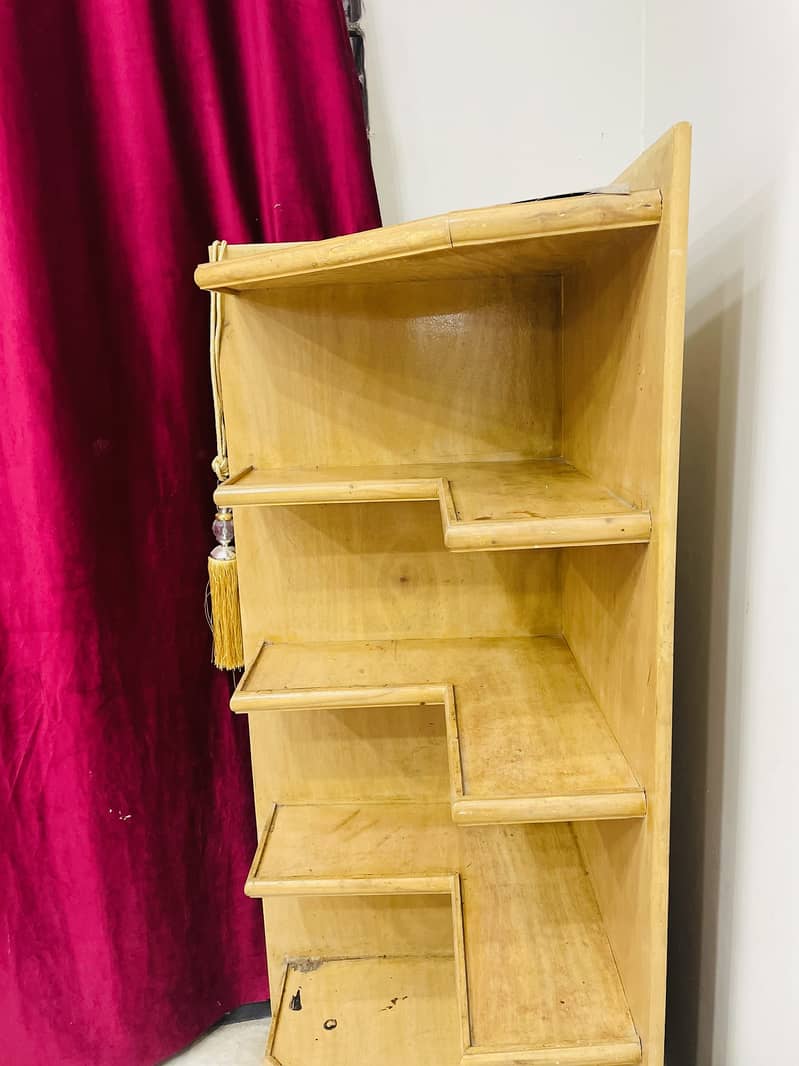 Bookshelf or rack especially constomized to fit the side of the wall 5