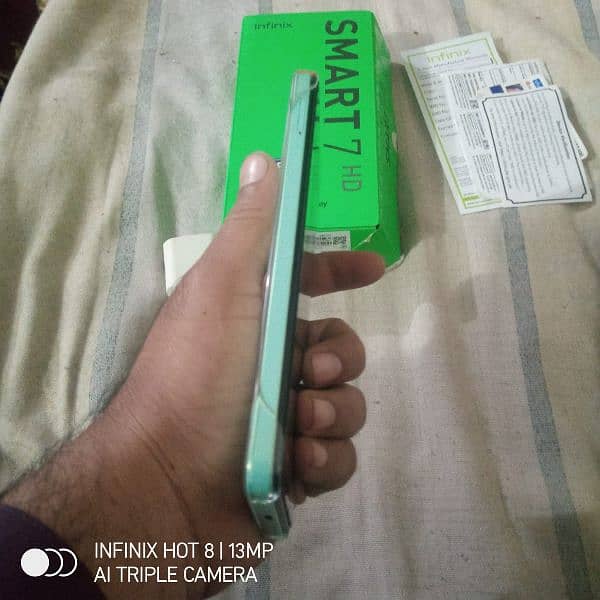 10/10 Infinix smart 7/4//64 with boxcharger 3