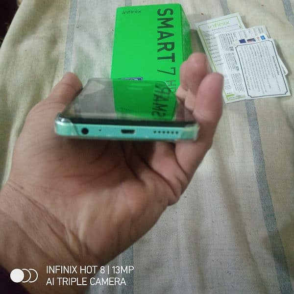 10/10 Infinix smart 7/4//64 with boxcharger 4