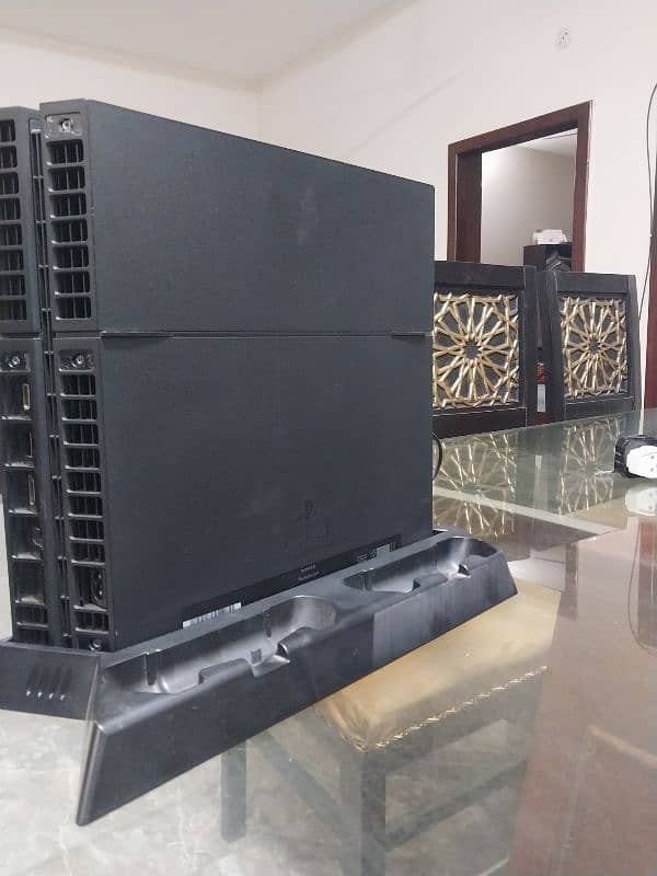 PS4 Base Model 500 GB Storage With A Controller And A Cooling Fan 2