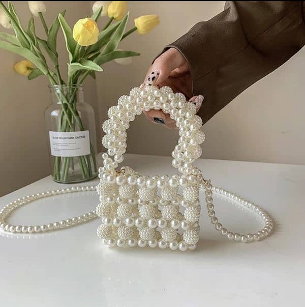 Fancy pearl cross body bags 0