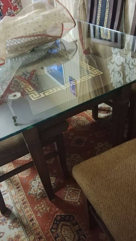 almost new dinning table with 6 chairs 1