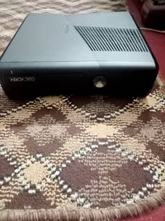 Xbox 360 slim with two controllers