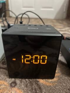 Table clock with radio