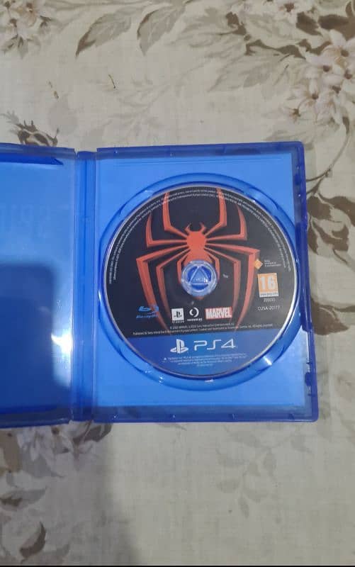 Spiderman Miles Morales PS4 with PS5 upgrade available barely used. 3