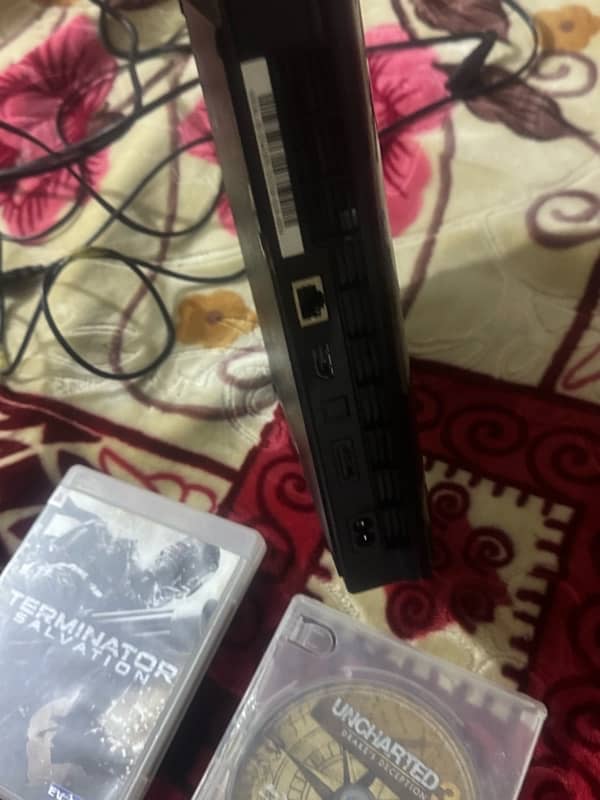 PlayStation 3 slim for sale in good condition with controller 2