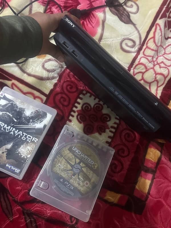 PlayStation 3 slim for sale in good condition with controller 3