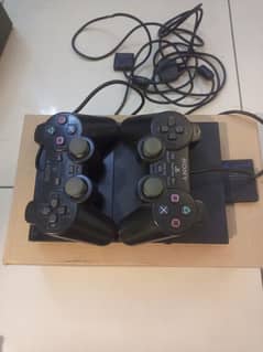 PS2 slim two controllers