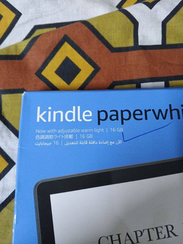 Kindle. . . . for book reading. . . . absolute new and pin packed. . 2