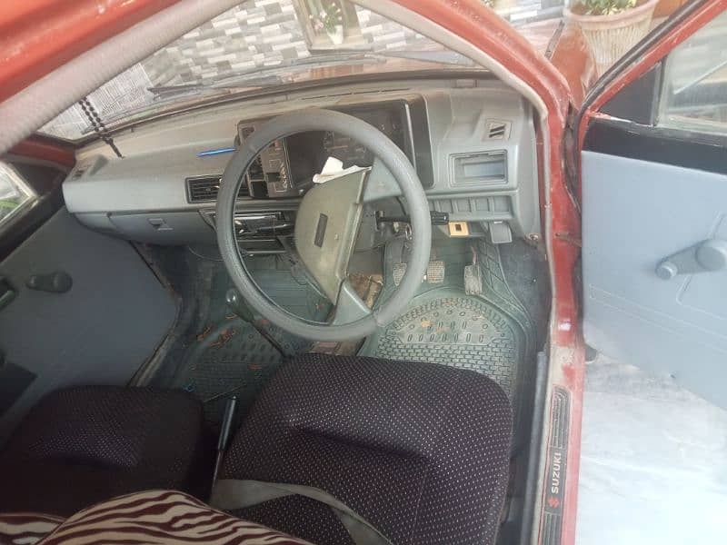 I am selling my Mehran 1996 model Lahore registered 4