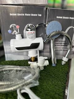 Instant electric hot water tap geyser