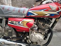 honda 125 totally genman. first hand. paper compete.