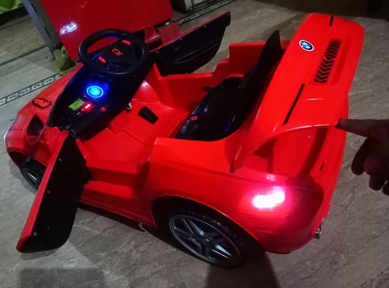 kids BMW imported car Good condition 100℅ok with remotecontrol & swing 3