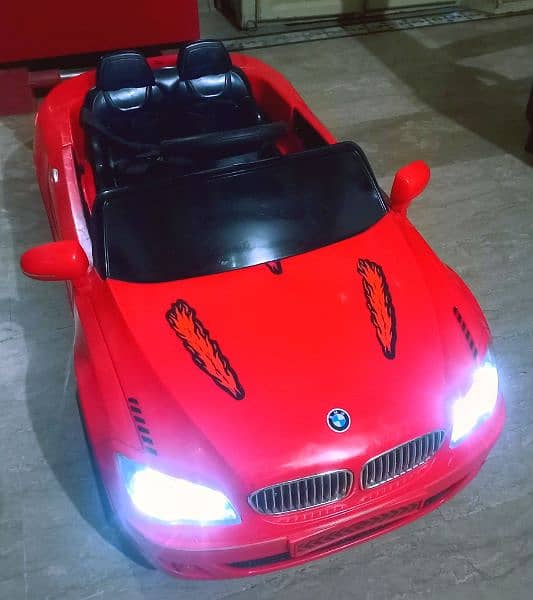 kids BMW imported car Good condition 100℅ok with remotecontrol & swing 6