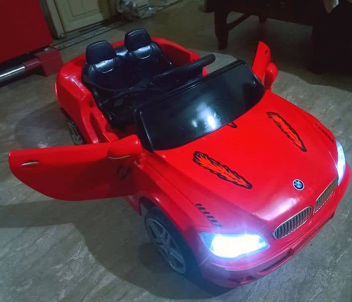 kids BMW imported car Good condition 100℅ok with remotecontrol & swing 8