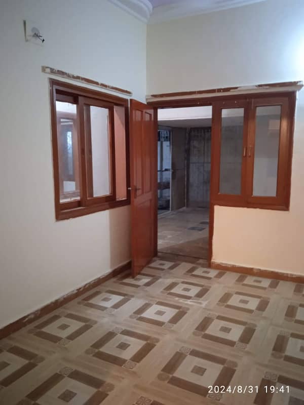 gulshan e iqbal block 1 lower portion 2 bed dd well maintained reday to move 3