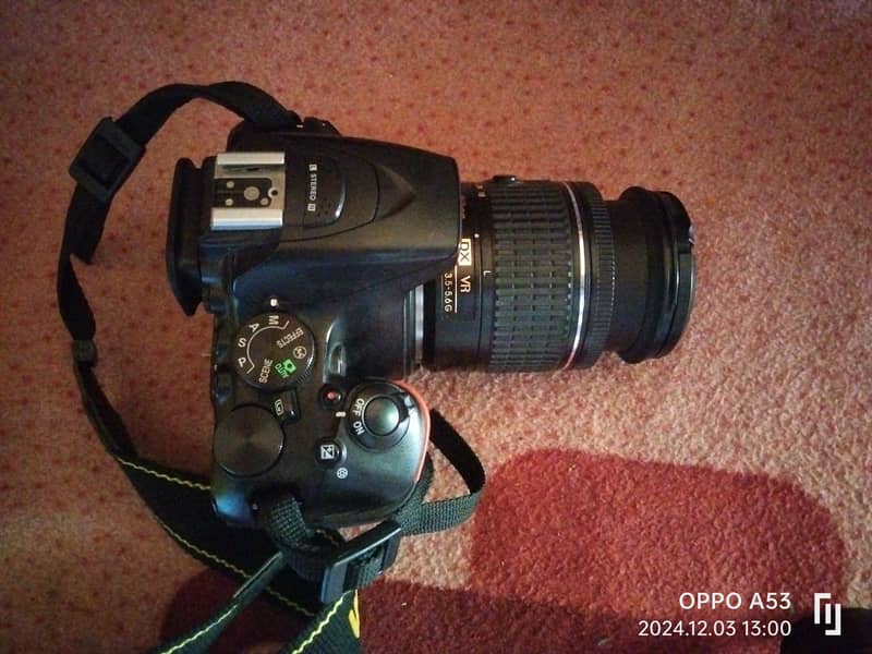 Nikon D5000 with 2 lens  33/55   & 70/300 2