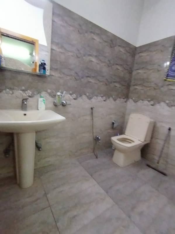 10marla 3beds DD TV lounge kitchen attached baths neat clean open basement for rent in G 13 4 islamabad 2