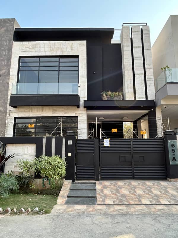 5 Marla full house available for rent in dha phase 9 town very good location 0