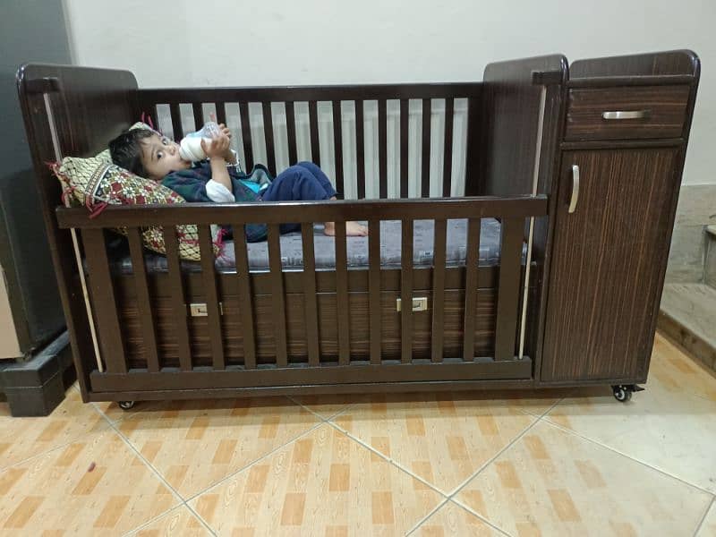 wooden kids cot with bedding accessories 1