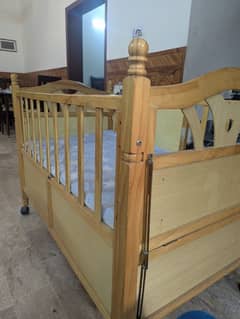 wooden baby cot