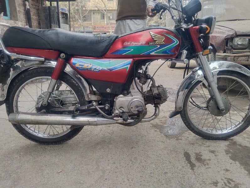 Honda CD 70 one hand use 1