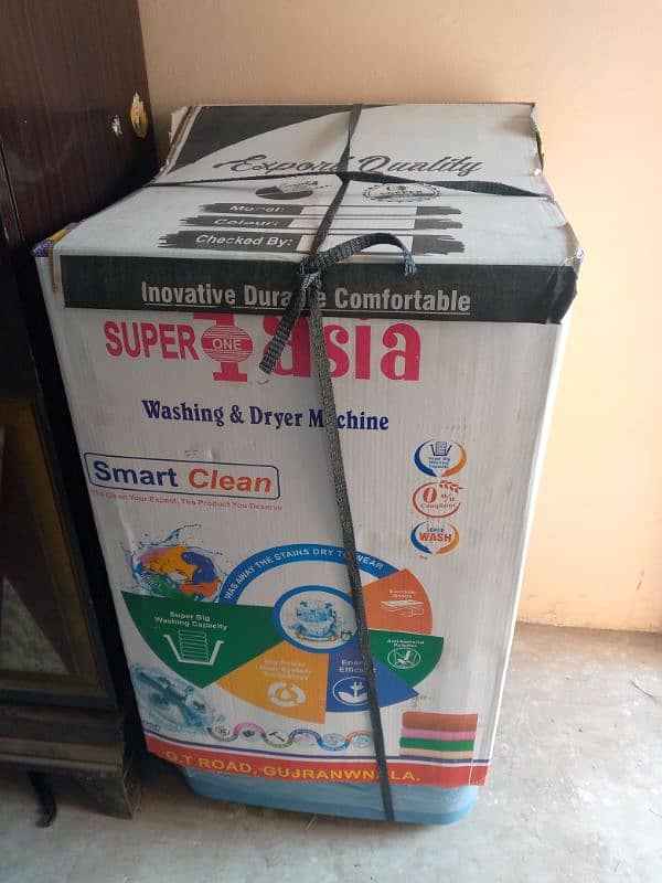 super 1 Asia ka aik dryer ha. . . . or aik washing machine ha 0