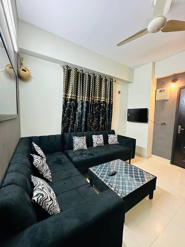 One bed luxury furnished apartment available for rent in gulberg greens islamabad. 2