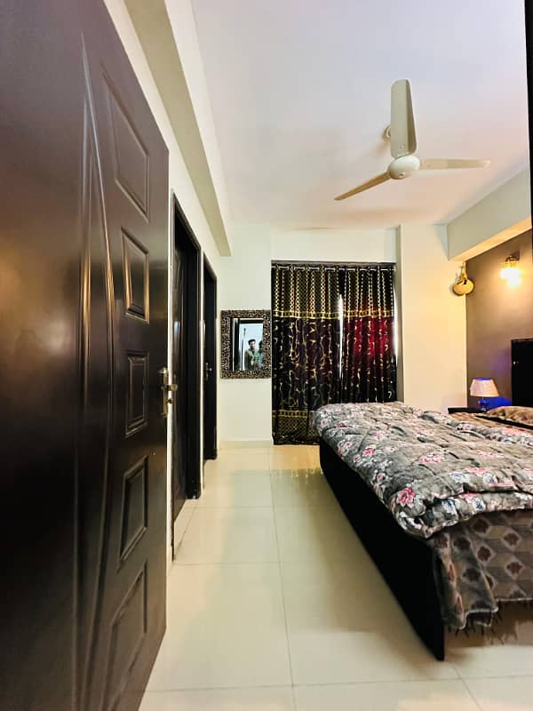 One bed luxury furnished apartment available for rent in gulberg greens islamabad. 7