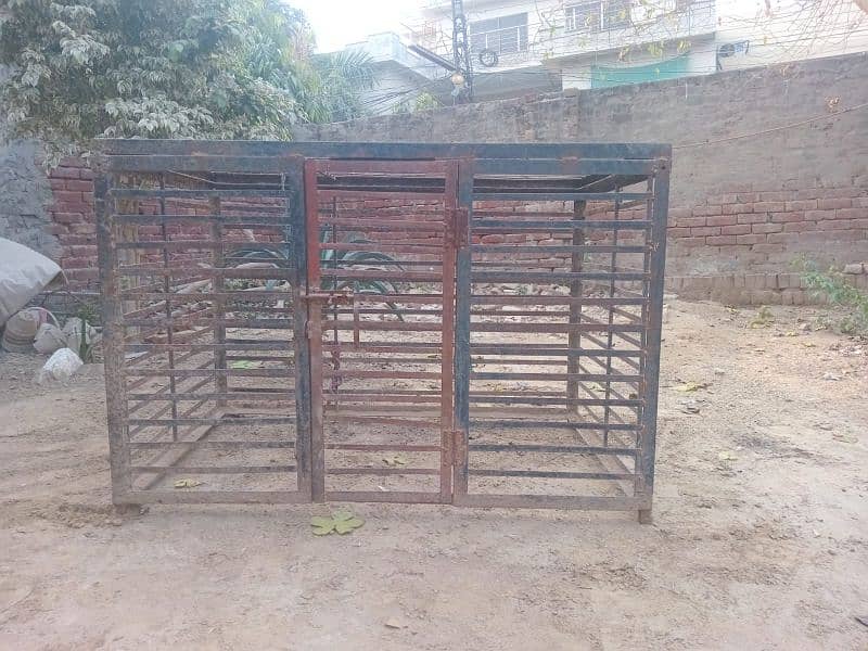 2 iron cages and 1 wooden cage 0