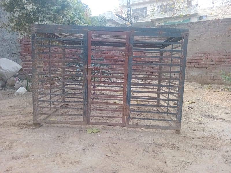 2 iron cages and 1 wooden cage 1