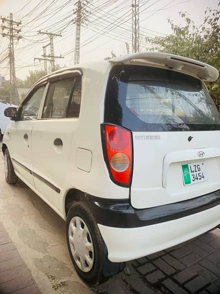 Hyundai Santro 2004          mehran  cultus coure city alto 0