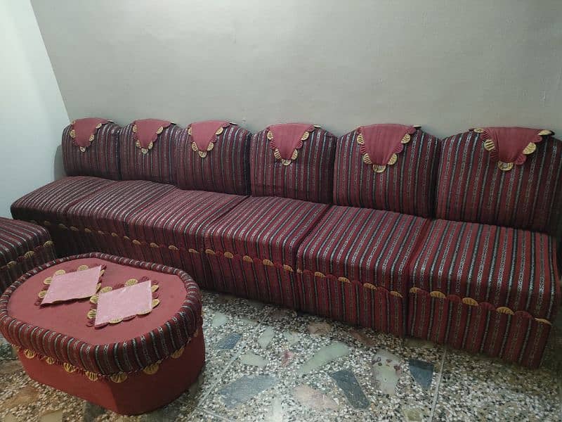 single 9 peace sofa with 2 tables and one corner table 1