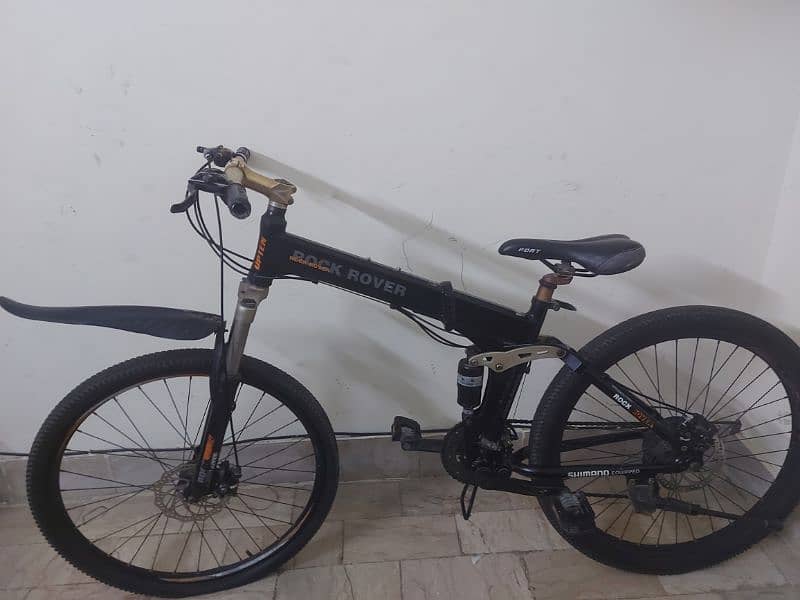 italian foldable cycle with free skate shoes and free seat cover 2