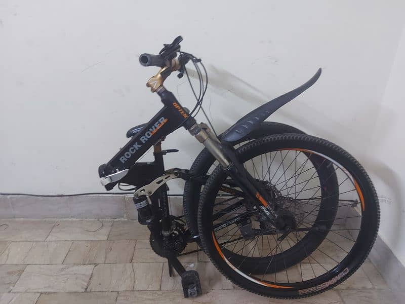 italian foldable cycle with free skate shoes and free seat cover 9