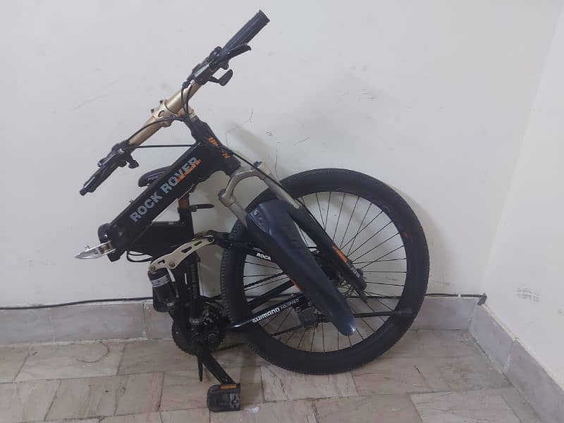 italian foldable cycle with free skate shoes and free seat cover 11