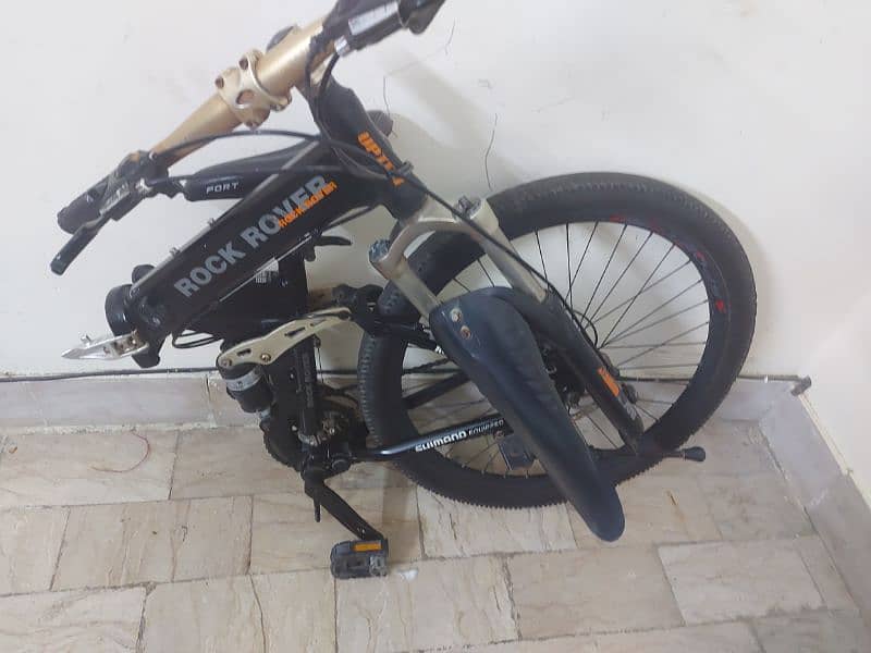 italian foldable cycle with free skate shoes and free seat cover 12