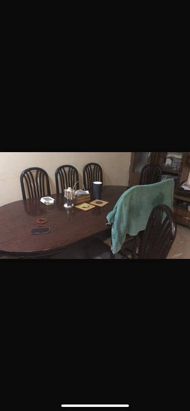 8 Wooden Chairs and Dining Table 0