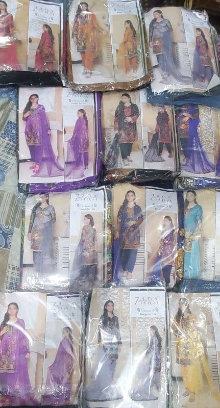 sale 50% discount 12 Lawn suits packet difrent design good fabric 9