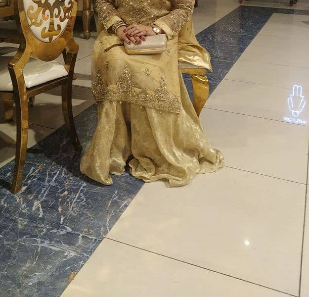 golden shirt , gharara with clutch 2